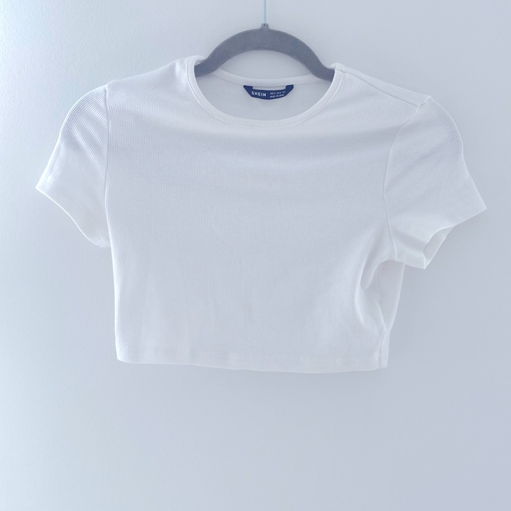 White cropped shirt.